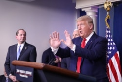 FILE - President Donald Trump speaks at the daily coronavirus task force briefing at the White House in Washington, April 3, 2020.