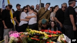 FILE —Mourners attend the funeral of Israeli soldier, Noa Marciano, in Modiin, Israel, November 17, 2023. The Israeli military said Marciano's body was found in a building near Shifa Hospital in Gaza. Marciano is one of three hostages declared dead since October 7.