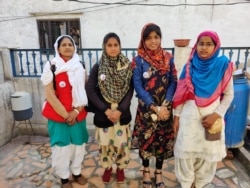 The girls who made it to college despite facing odds are now spreading the message in their villages about the importance of educating girls. From left to right: Shahnaz Bano, Arastoon, Anjul Islam and Rizwana. (Anjana Pasricha/VOA)