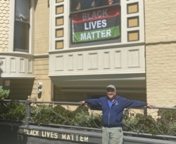 James "Jaime" Juanillo stands in front of his San Francisco home. (Courtesy James Juanillo)