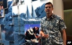 National Oceanic and Atmospheric Administration oceanographer Jamison Gove talks about coral bleaching at the NOAA regional office in Honolulu, Sept. 16, 2019.