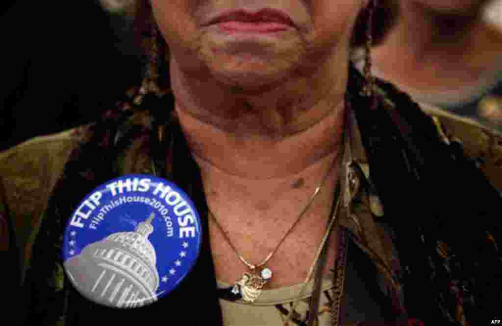 Paula Jost, of Palm Springs, Calif., wears a campaign button at a rally for Republicans in Anaheim, Calif., Saturday, Oct. 16, 2010. (AP Photo/Jae C. Hong)