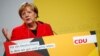 Merkel Dismisses Hecklers as Polls Point to 4th Term