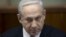 Israeli Prime Minister Benjamin Netanyahu heads the weekly cabinet meeting, Jerusalem, Feb. 10, 2013.