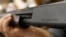 FILE - In this March 1, 2018 photo, the Remington name is seen etched on a model 870 shotgun at a shop in New Castle, Pa. Mexico said that it filed a second lawsuit Monday against the U.S. firearms industry.