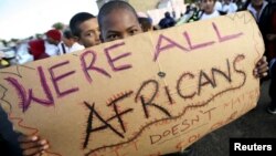 FILE: Migrants in Cape Town's Mannenberg community demonstrate against xenophobia. (UTERS/Mike Hutchings)