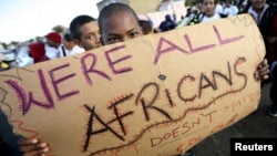 Migrants in Cape Town's Mannenberg community demonstrate against xenophobia. (UTERS/Mike Hutchings)