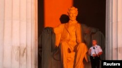 FILE - U.S. Park Police watch over the Lincoln Memorial, Aug. 24, 2013. 