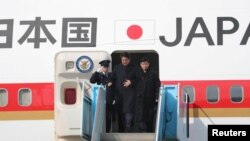 安倍2018年2月9日抵达韩国访问（路透社）