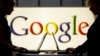 FILE - Exhibitors work on laptop computers in front of a sign of the Google logo at the industrial fair Hannover Messe, Germany, Apr. 17, 2007. Google lost its final legal challenge against a EU for giving its own shopping recommendations an illegal advantage in search results. 