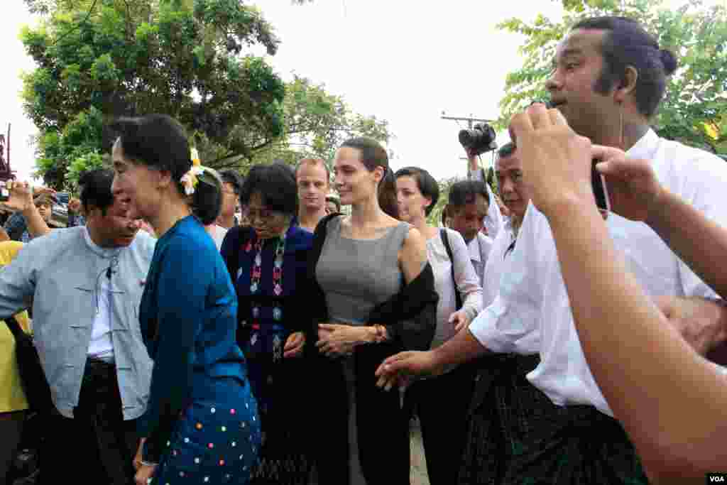 Daw Aung San Suu Kyi and Hollywood atress Angelina Jolie Pitt, United Nations High Commissioner for Refugees special envoy and co-founder of the Preventing Sexual Violence Initiative,visits Yangon, Hlaing Tharyar industrial area to study female workers a