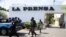 Nicaraguan police take part in a raid at the offices of La Prensa, the only national newspaper, after President Daniel Ortega's government opened customs fraud and money laundering investigations against the publication, in Managua, Aug. 13, 2021. 