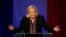 Far right National Front party leader Marine Le Pen delivers a speech after the announcement of partial results in the second round of regional elections, in Henin-Beaumont, northern France, Dec.13, 2015.