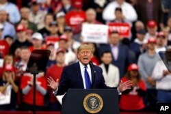 FILE - President Donald Trump speaks at a campaign rally in Milwaukee, Jan. 14, 2020.