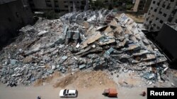 Një nga godinat e shkatërruara nga raketat izraelite në Gazë (21 maj 2021)