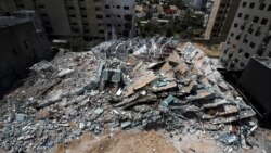Ostaci solitera uništenog u izraelskom bombardovanju u izraelskom vazdušnom uradu za vreme rata u Gazi koji je okončan prekidom vatre 21. maja 2021.