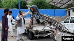 په کونړ ولایت کې په برید کې ویجاړ شوی موټر