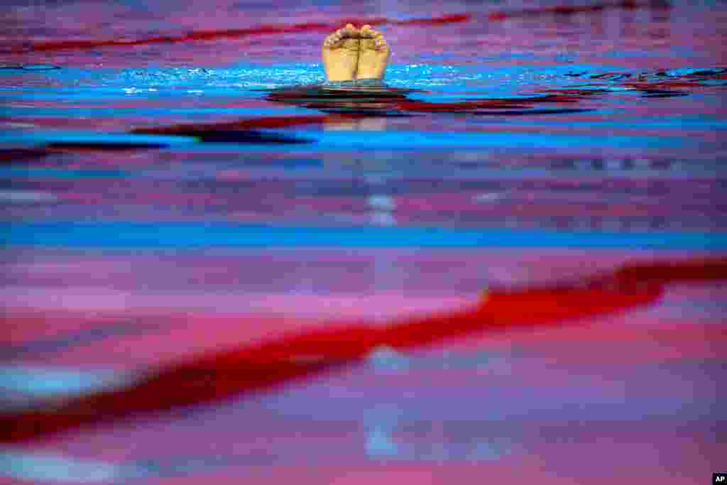 Defne Bakirci of Turkey competes in the preliminaries of solo technical artistic swimming at the World Swimming Championships in Gwangju, South Korea.