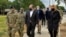 Marshall Billingslea, special presidential envoy for arms control, center, and National Nuclear Security Administration Administrator Lisa Gordon-Hagerty, right, walking with Air Force personnel between meetings in Albuquerque, N.M., Sep. 9, 2020. 
