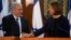 Israel's Prime Minister Benjamin Netanyahu (L) shakes hands with former Foreign Minister Tzipi Livni, head of the centrist Hatenuah party, during their joint statement at the Knesset, the Israeli parliament, in Jerusalem, February 19, 2013.
