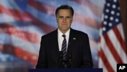 Republican presidential candidate and former Massachusetts Gov. Mitt Romney arrives at his election night rally in Boston, early Wednesday, Nov. 7, 2012. 