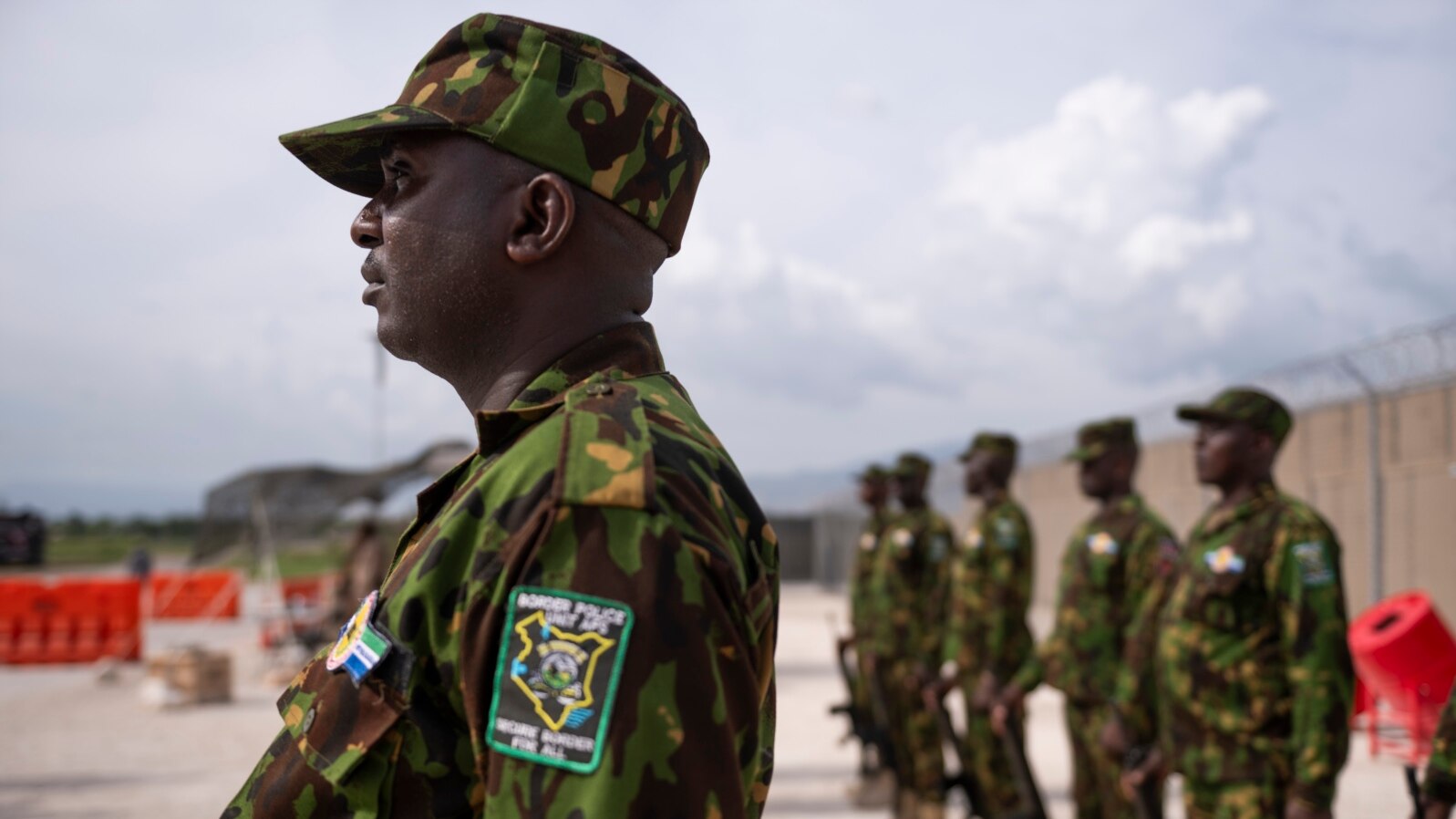 FILE - Kenyan members of the Multinational Security Support Mission stand at attention in Port-au-Prince, Haiti, on Sept. 5, 2024.