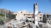 A view shows the remains of a building after it was destroyed in Israeli air strikes, amid a flare-up of Israeli-Palestinian fighting, in Gaza City May 18, 2021.