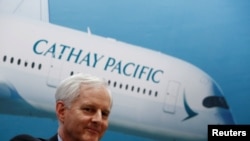 Cathay Pacific Group Chairman John Slosar attends a news conference on the carrier's annual results in Hong Kong, China, March 14, 2018. 