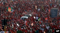 Members of the Economic Freedom Fighters party march for economic transformation in Johannesburg, South Africa, Oct. 27, 2015.