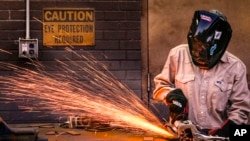 Student Abbey Carlson works during welding class at Tennessee College of Applied Technology Nashville, April 13, 2023, in Nashville, Tennessee. 