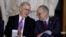 FILE - Senate Majority Leader Mitch McConnell, left, and Senate Minority Leader Chuck Schumer talk during a Capitol Hill ceremony in Washington, Oct. 25, 2017.