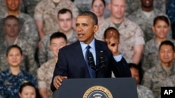 U.S. President Barack Obama addresses U.S. military personnel at Yongsan Army Garrison in Seoul, South Korea, Saturday. ( April 26, 2014.) 