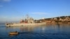 A ship carrying 49 migrants, according to Italian authorities, arrives at the Albanian port of Shengjin days after Italy resumed following a months-long pause on the transfer of asylum seekers to its maritime neighbor, on Jan. 28, 2025.