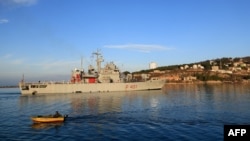 A ship carrying 49 migrants, according to Italian authorities, arrives at the Albanian port of Shengjin days after Italy resumed following a months-long pause on the transfer of asylum seekers to its maritime neighbor, on Jan. 28, 2025.