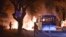 Firefighters work at a scene of fire from an explosion in Ankara that killed 28 people, Feb. 17, 2016. 