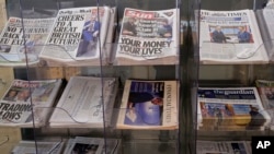 A selection of British national newspapers on sale at newsagents in London, March 30, 2017. 