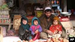 Japanese fencing Olympian Yuki Ota participates in a demonstration with talking robot Mirata during a news conference in support of the Tokyo 2020 summer Olympics candidacy in Buenos Aires, Argentina. The International Olympic Committee (IOC) will elect the host city for the 2020 summer Olympics at their session Sept. 7.
