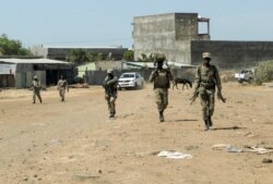 Members of the Amhara Special Force return to the Dansha Mechanized 5th division military base after fighting against the Tigray People's Liberation Front (TPLF), in Danasha, Amhara region, near a border with Tigray, Ethiopia, Nov. 9, 2020.