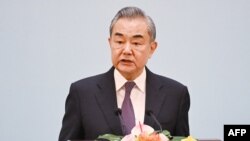 FILE - China's Foreign Minister Wang Yi speaks at a ceremony marking the 70th anniversary of the Five Principles of Peaceful Coexistence, at the Diaoyutai State Guesthouse in Beijing on June 28, 2024.