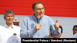 Peruvian President Martin Vizcarra visits flood victims in the northern city of Piura, Peru, March 27, 2018.