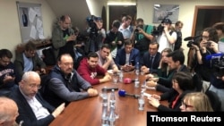 Russian opposition figures and excluded election candidates attend a meeting with members of the Presidential Council for Civil Society and Human Rights ahead of elections to Moscow City Duma, the capital's regional parliament, in Moscow, July 25, 2019.