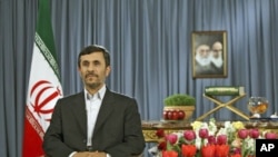 Iranian President Mahmoud Ahmadinejad takes part in a live TV program in Tehran on the occasion of the Iranian New Year, March 21, 2011