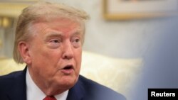 2026년 8월 17일 미국 워싱턴 D.C. 백악관 집무실에서 도널드 트럼프 미국 대통령이 기자의 질문에 답하고 있다.