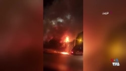 بنر «خامنه‌ای» در قزوین به آتش کشیده شد
