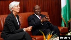 FILE - Ivorian Prime Minister Daniel Kablan Duncan (R) is seen meeting with IMF Managing Director Christine Lagarde.