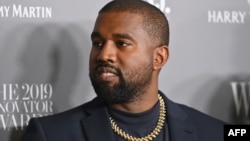 (FILES) In this file photo taken on November 6, 2019, US rapper Kanye West attends the WSJ Magazine 2019 Innovator Awards at MOMA in New York City. - The struggling Gap brand has inked a deal with the mercurial Kanye West to produce a new line…