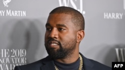FILE - In this photo taken Nov. 6, 2019, US rapper Kanye West attends the WSJ Magazine 2019 Innovator Awards at MOMA in New York City.