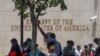 Haitians gather outside the U.S. Embassy after the assassination of President Jovenel Moise, in Port-au-Prince, Haiti, July 9, 2021.