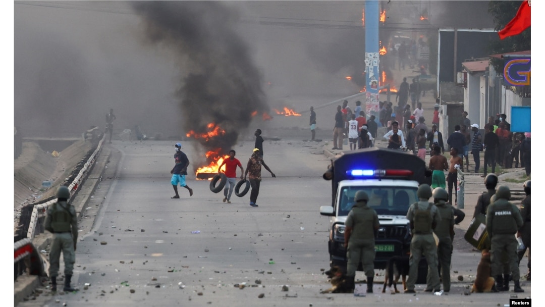 FILE - Protesters burn tires after Mozambique's ruling party, FRELIMO, retains power in contested election in Maputo, Oct. 24, 2024.