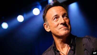 bruce springsteen all dressed up in blue Bruce Springsteen performing in a blue blazer Photo Print - Bed Bath &  Beyond